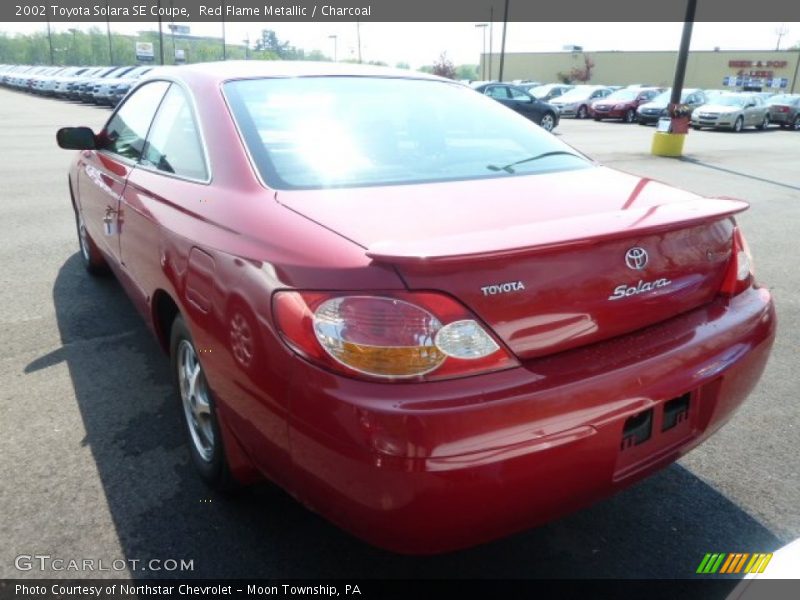 Red Flame Metallic / Charcoal 2002 Toyota Solara SE Coupe
