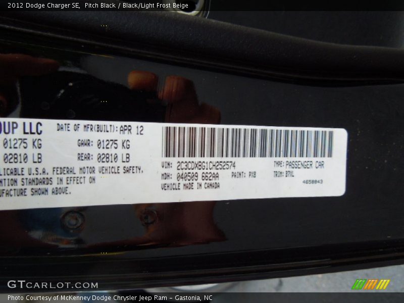 Pitch Black / Black/Light Frost Beige 2012 Dodge Charger SE