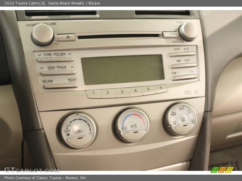 Sandy Beach Metallic / Bisque 2010 Toyota Camry LE