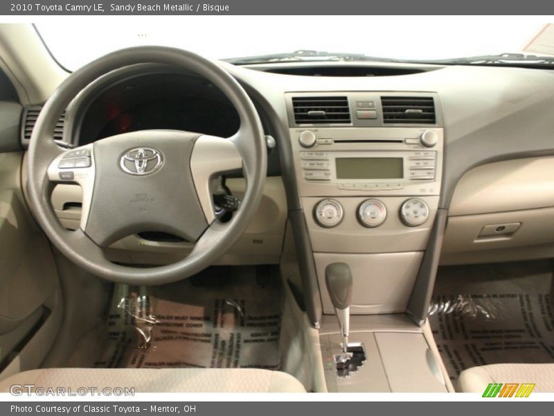 Sandy Beach Metallic / Bisque 2010 Toyota Camry LE