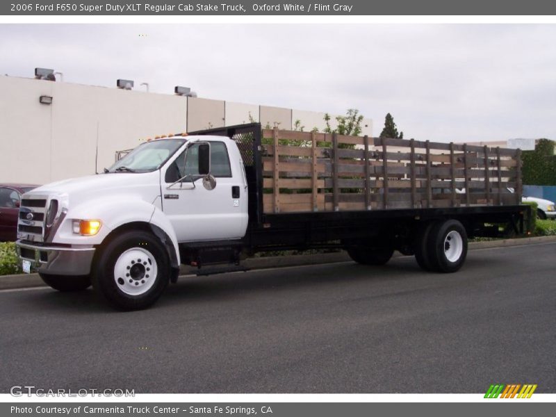 Front 3/4 View of 2006 F650 Super Duty XLT Regular Cab Stake Truck
