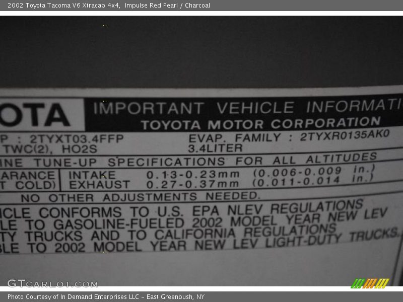 Impulse Red Pearl / Charcoal 2002 Toyota Tacoma V6 Xtracab 4x4