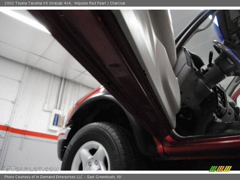 Impulse Red Pearl / Charcoal 2002 Toyota Tacoma V6 Xtracab 4x4