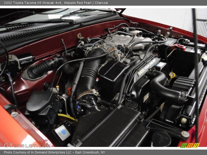 Impulse Red Pearl / Charcoal 2002 Toyota Tacoma V6 Xtracab 4x4