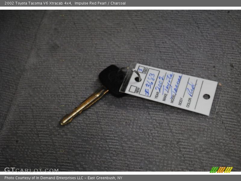Impulse Red Pearl / Charcoal 2002 Toyota Tacoma V6 Xtracab 4x4