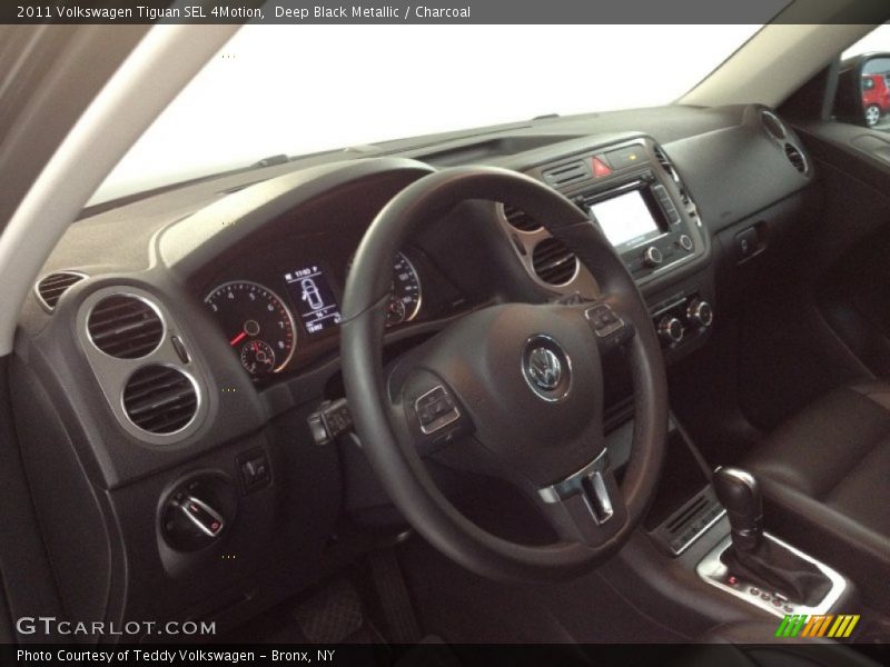 Deep Black Metallic / Charcoal 2011 Volkswagen Tiguan SEL 4Motion