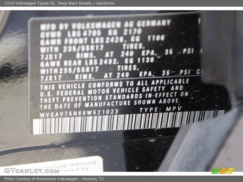 Deep Black Metallic / Sandstone 2009 Volkswagen Tiguan SE