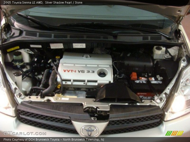 Silver Shadow Pearl / Stone 2005 Toyota Sienna LE AWD