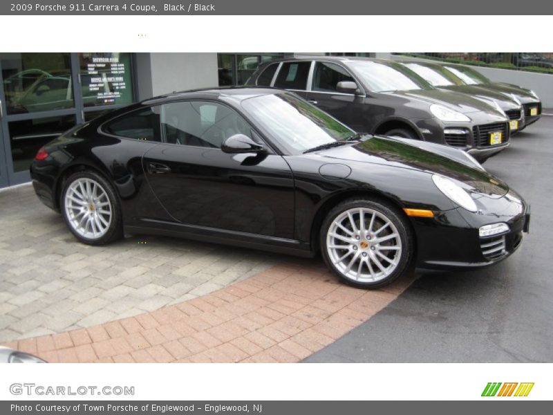 Black / Black 2009 Porsche 911 Carrera 4 Coupe