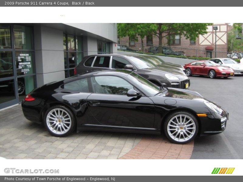 Black / Black 2009 Porsche 911 Carrera 4 Coupe