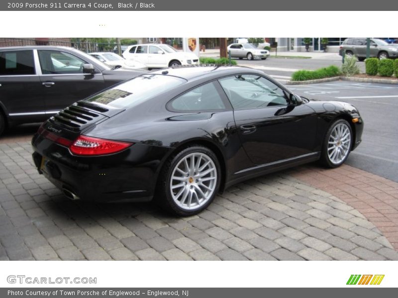 Black / Black 2009 Porsche 911 Carrera 4 Coupe