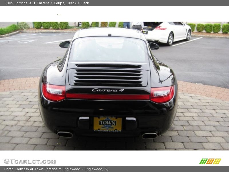 Black / Black 2009 Porsche 911 Carrera 4 Coupe