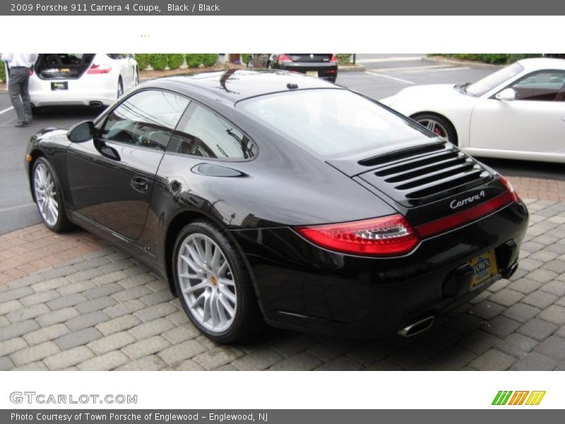 Black / Black 2009 Porsche 911 Carrera 4 Coupe