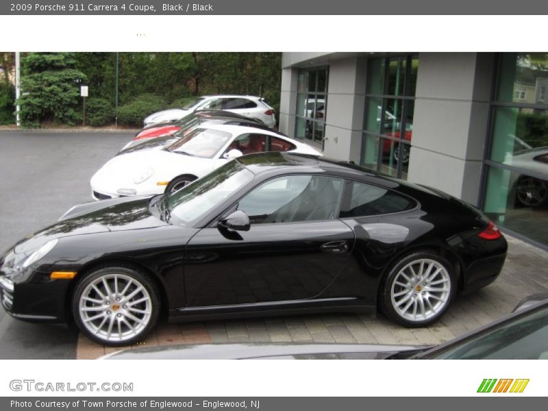 Black / Black 2009 Porsche 911 Carrera 4 Coupe