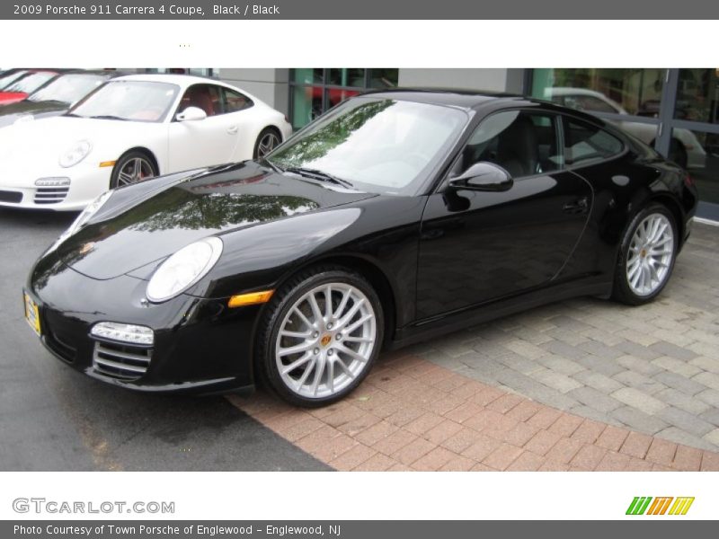 Black / Black 2009 Porsche 911 Carrera 4 Coupe