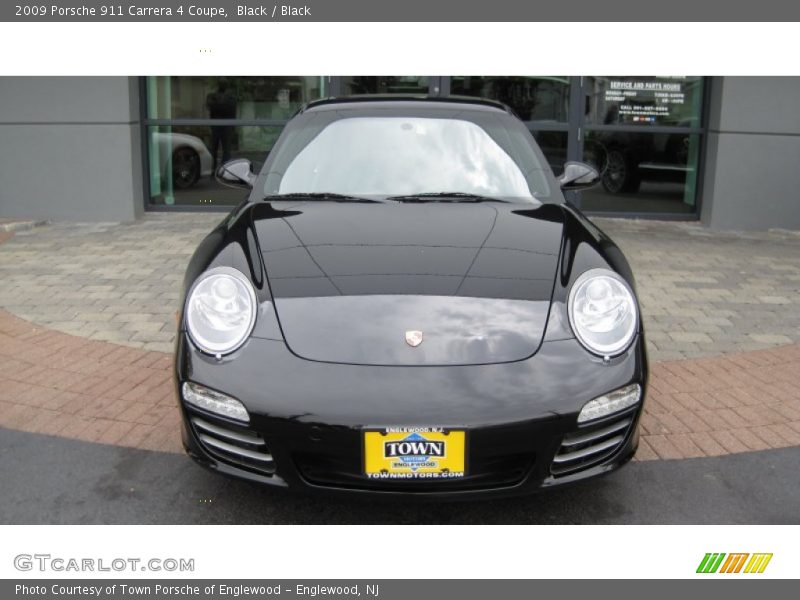 Black / Black 2009 Porsche 911 Carrera 4 Coupe