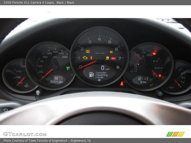 Black / Black 2009 Porsche 911 Carrera 4 Coupe