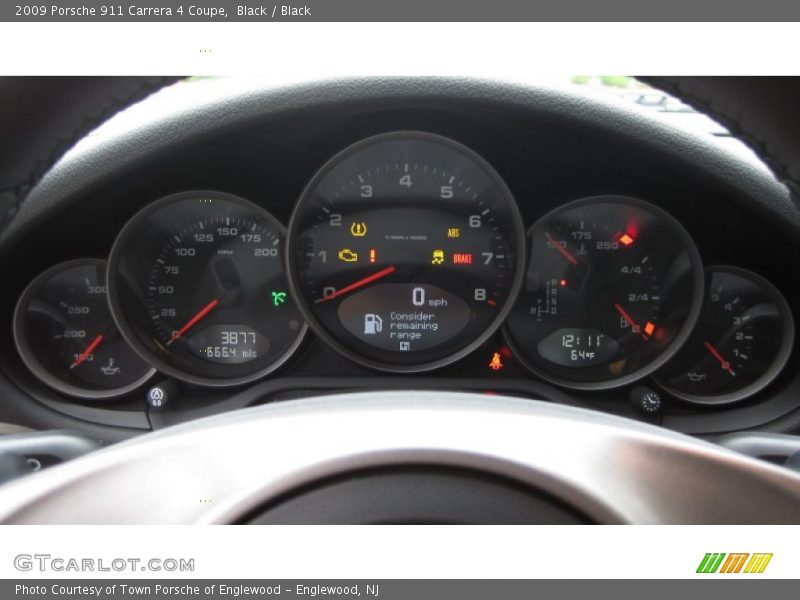 Black / Black 2009 Porsche 911 Carrera 4 Coupe