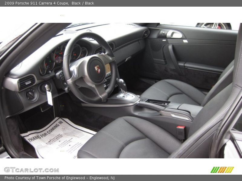 Black / Black 2009 Porsche 911 Carrera 4 Coupe