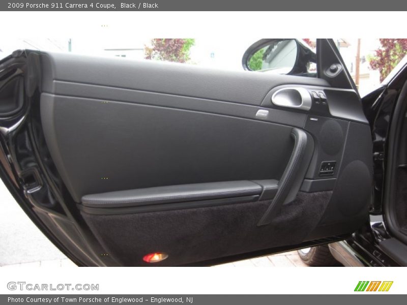 Black / Black 2009 Porsche 911 Carrera 4 Coupe