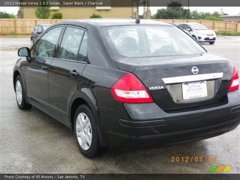 Super Black / Charcoal 2011 Nissan Versa 1.8 S Sedan