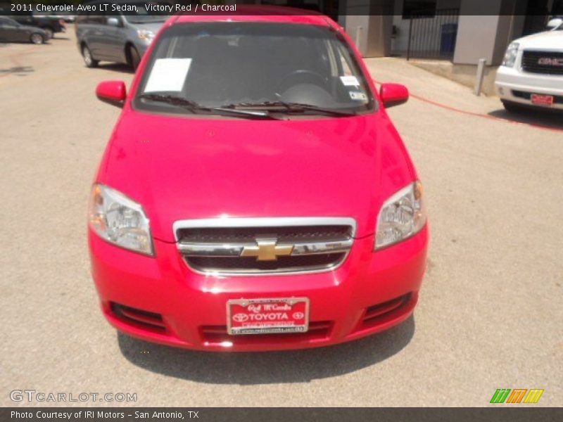 Victory Red / Charcoal 2011 Chevrolet Aveo LT Sedan