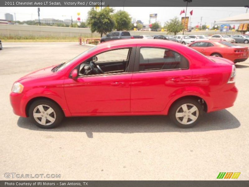 Victory Red / Charcoal 2011 Chevrolet Aveo LT Sedan
