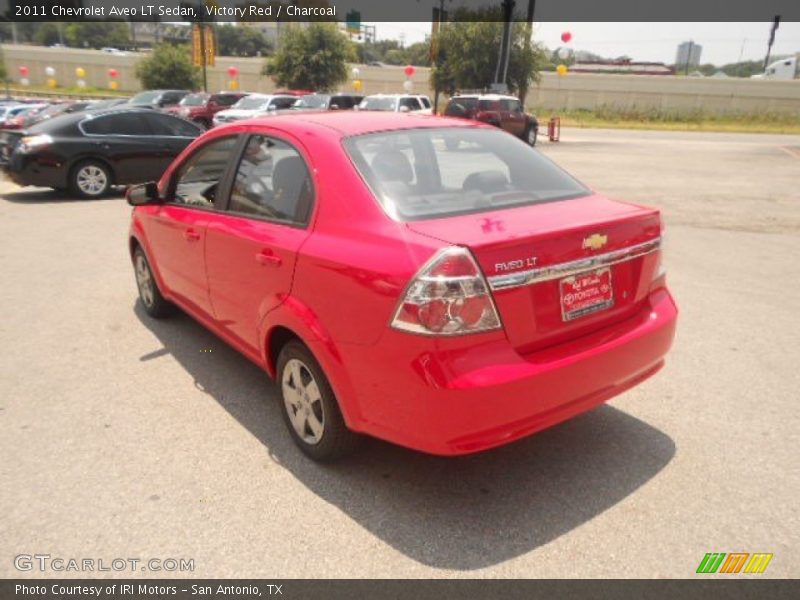 Victory Red / Charcoal 2011 Chevrolet Aveo LT Sedan