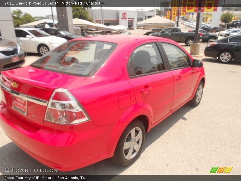 Victory Red / Charcoal 2011 Chevrolet Aveo LT Sedan