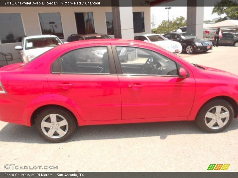 Victory Red / Charcoal 2011 Chevrolet Aveo LT Sedan