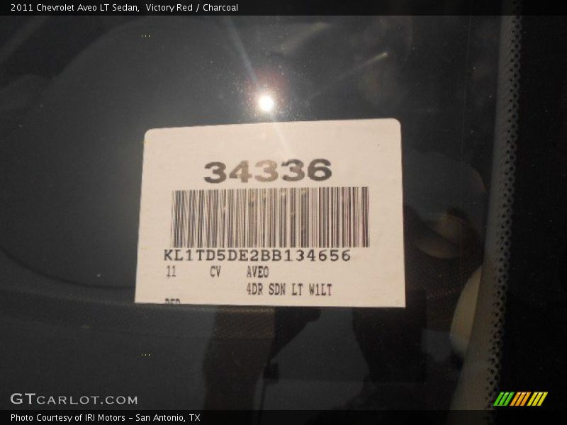Victory Red / Charcoal 2011 Chevrolet Aveo LT Sedan