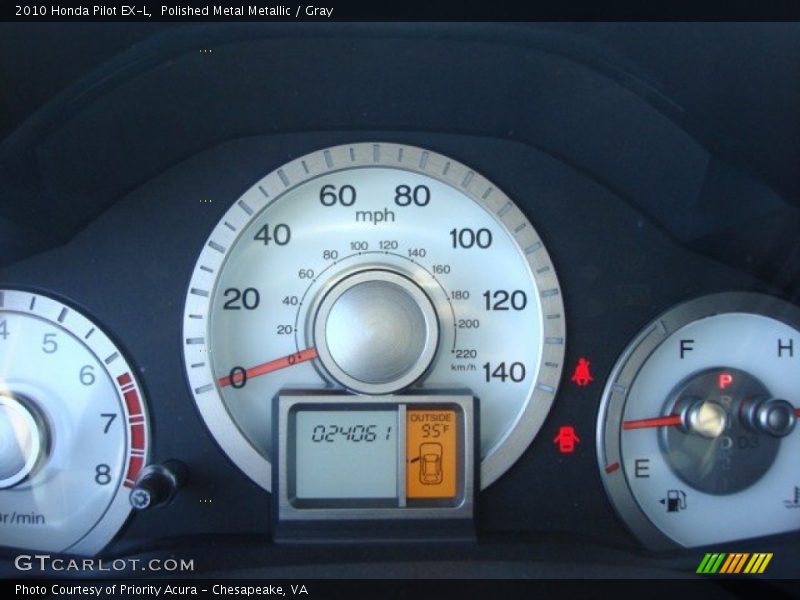 Polished Metal Metallic / Gray 2010 Honda Pilot EX-L