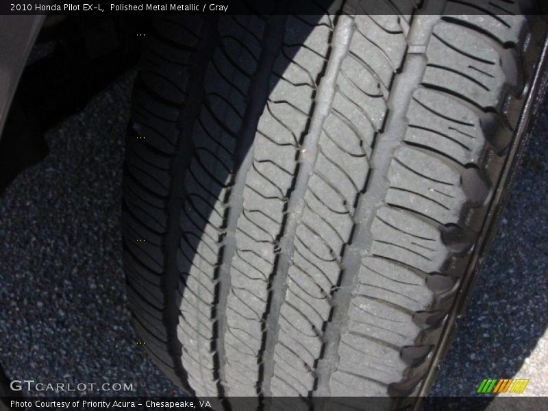Polished Metal Metallic / Gray 2010 Honda Pilot EX-L