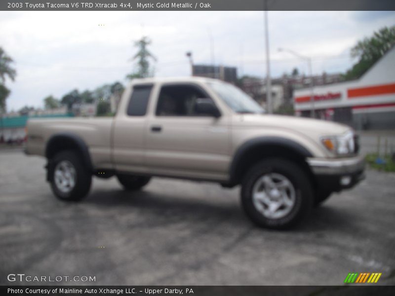 Mystic Gold Metallic / Oak 2003 Toyota Tacoma V6 TRD Xtracab 4x4