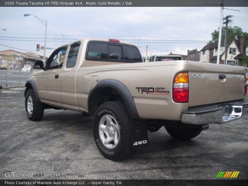 Mystic Gold Metallic / Oak 2003 Toyota Tacoma V6 TRD Xtracab 4x4