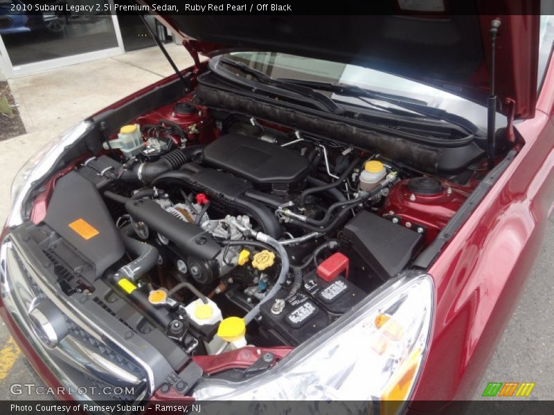 Ruby Red Pearl / Off Black 2010 Subaru Legacy 2.5i Premium Sedan