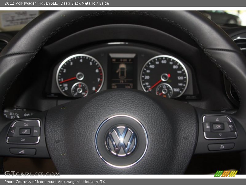 Deep Black Metallic / Beige 2012 Volkswagen Tiguan SEL