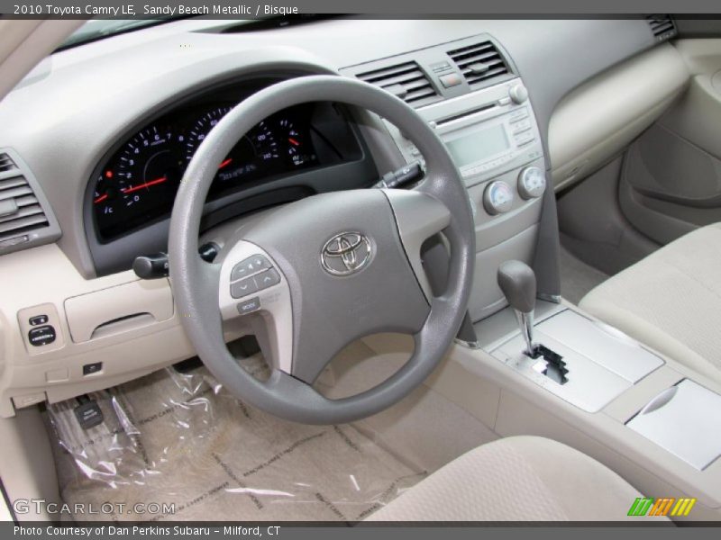 Sandy Beach Metallic / Bisque 2010 Toyota Camry LE