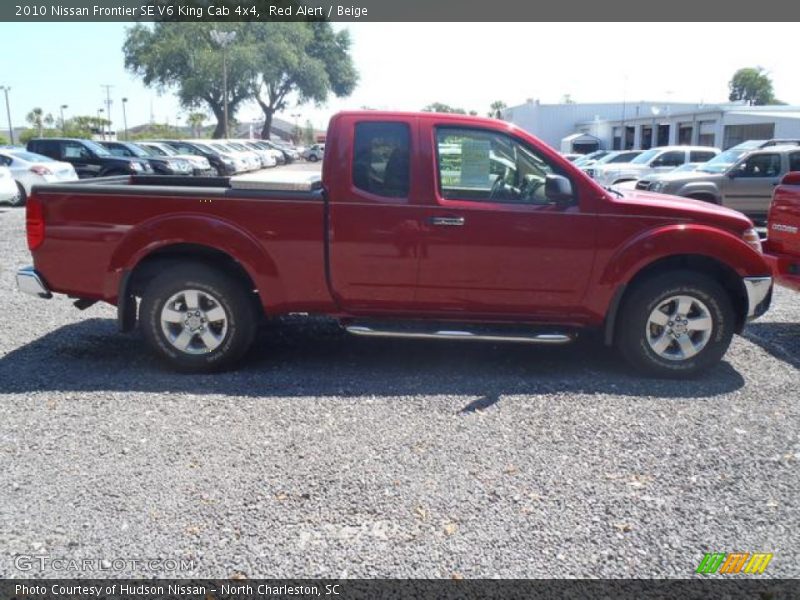 Red Alert / Beige 2010 Nissan Frontier SE V6 King Cab 4x4