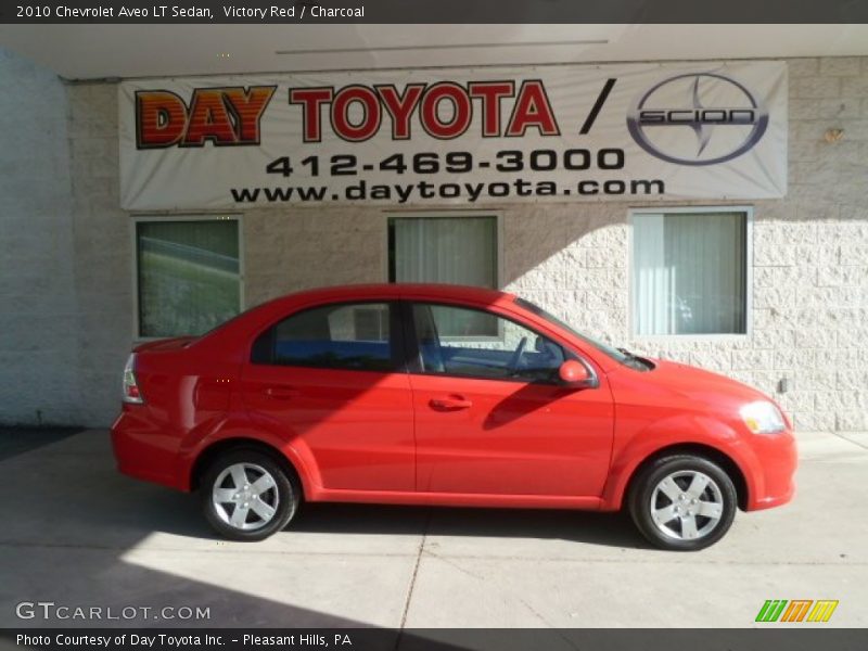 Victory Red / Charcoal 2010 Chevrolet Aveo LT Sedan