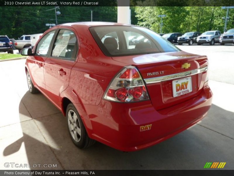 Victory Red / Charcoal 2010 Chevrolet Aveo LT Sedan