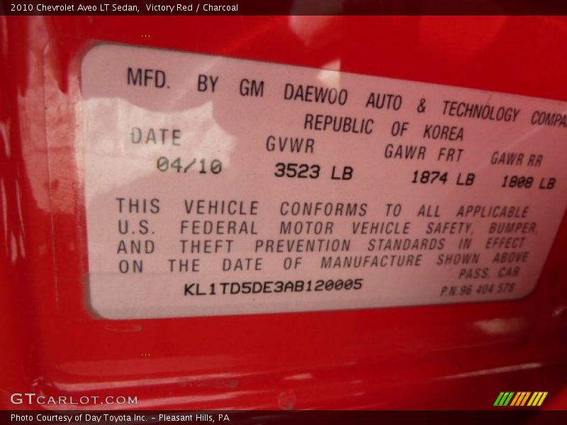 Victory Red / Charcoal 2010 Chevrolet Aveo LT Sedan