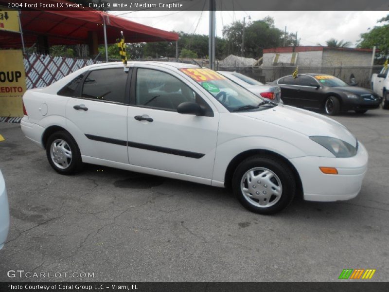 Cloud 9 White / Medium Graphite 2004 Ford Focus LX Sedan