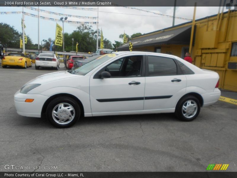 Cloud 9 White / Medium Graphite 2004 Ford Focus LX Sedan