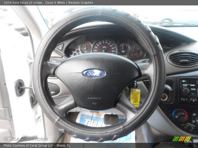 Cloud 9 White / Medium Graphite 2004 Ford Focus LX Sedan
