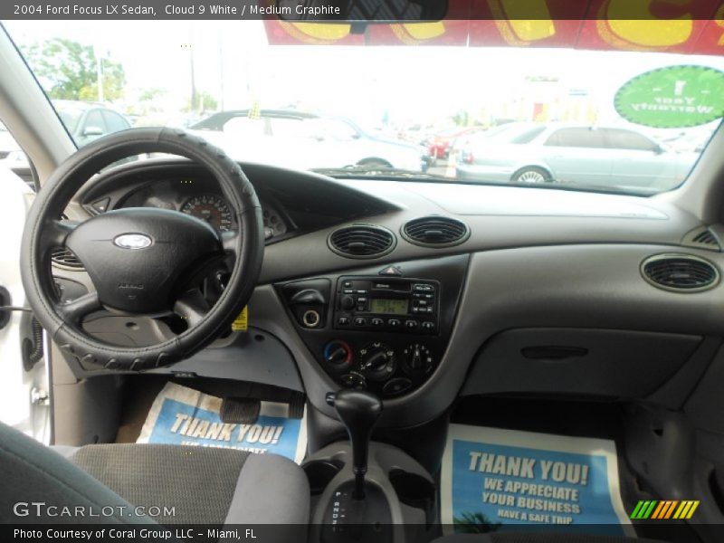 Cloud 9 White / Medium Graphite 2004 Ford Focus LX Sedan