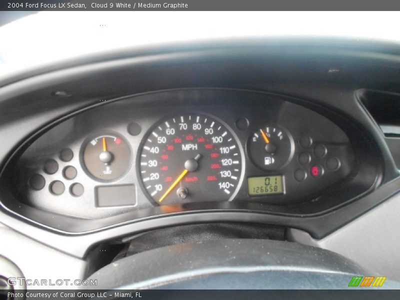 Cloud 9 White / Medium Graphite 2004 Ford Focus LX Sedan