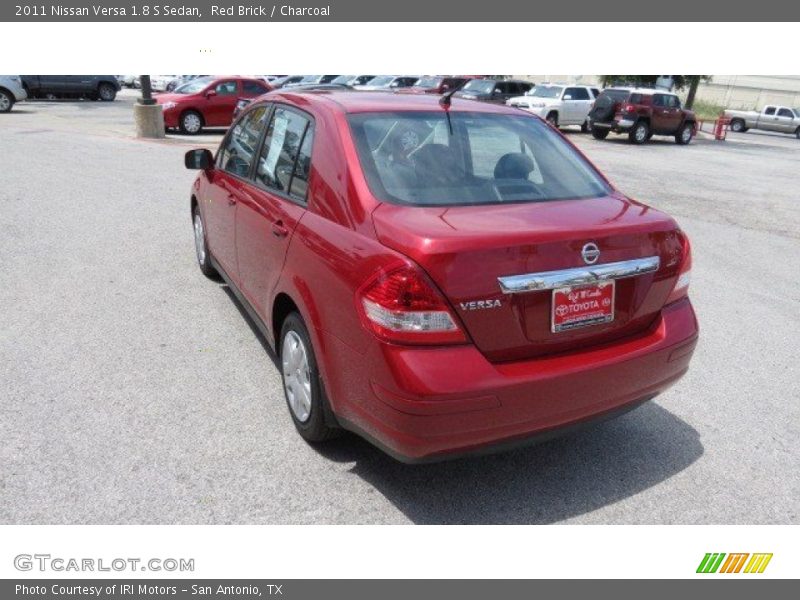 Red Brick / Charcoal 2011 Nissan Versa 1.8 S Sedan