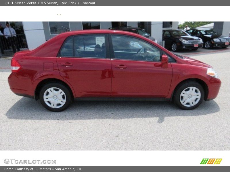 Red Brick / Charcoal 2011 Nissan Versa 1.8 S Sedan