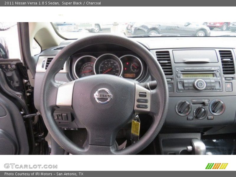 Super Black / Charcoal 2011 Nissan Versa 1.8 S Sedan